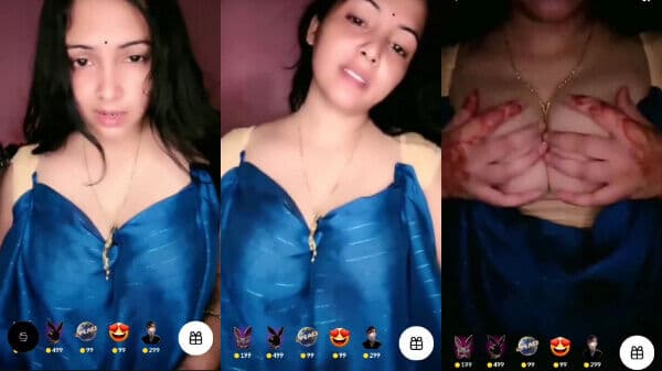 Lusty Delhi bhabhi exposing big, juicy boobs on Tango